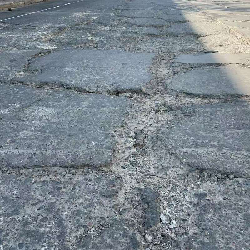 穆棱路面起砂露石子修补料